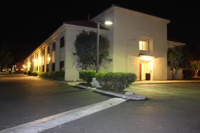a building on a street at night at Ocean Gateway Inn in Santa Paula