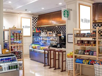 a grocery store with a counter and some food at Hilton Los Angeles Airport in Los Angeles