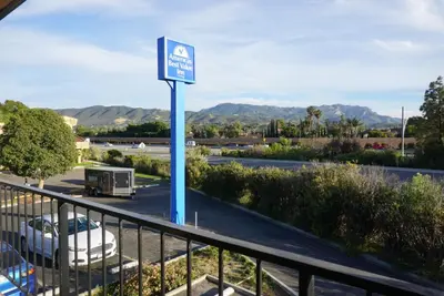 a sign for a gas station on a street at Americas Best Value Inn Thousand Oaks in Thousand Oaks