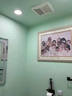 a picture of a group of people on a bathroom wall at Beautiful Foothill Home in Rancho Cucamonga