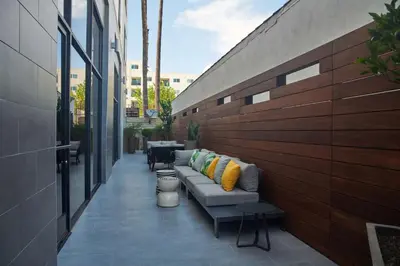 a row of pillows sitting on a patio at Hampton Inn & Suites Sherman Oaks in Sherman Oaks