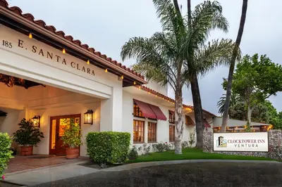 a building with a sign that reads santa clara club at Clocktower Inn Ventura in Ventura