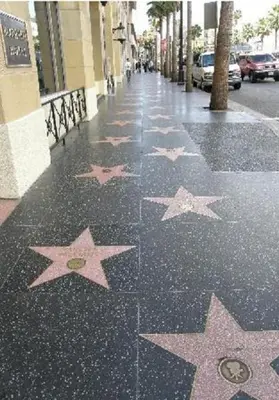 a sidewalk with stars painted on the ground at Eastsider Motel -Downtown LA New Rooms in Los Angeles
