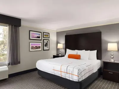 a hotel room with a large bed and a window at La Quinta by Wyndham Santa Clarita - Valencia in Stevenson Ranch