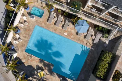an overhead view of a swimming pool at a resort at Hilton Garden Inn Los Angeles Marina Del Rey in Los Angeles