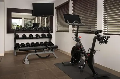 a room with a gym with a treadmill and a exercise bike at Hilton Garden Inn Los Angeles Marina Del Rey in Los Angeles