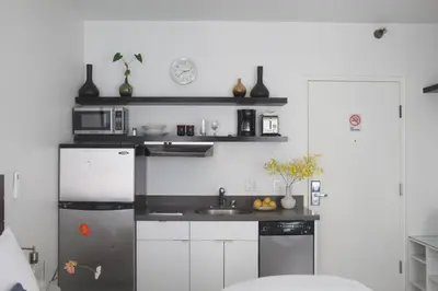 a kitchen with a refrigerator and a sink at Su Casa at Venice Beach in Los Angeles