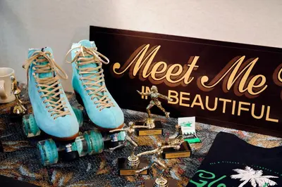 a pair of blue high heel shoes and a sign at Glendale Express Hotel Los Angeles in Glendale