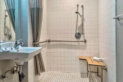 a bathroom with a sink and a shower at Motel 6-El Monte, CA - Los Angeles in El Monte