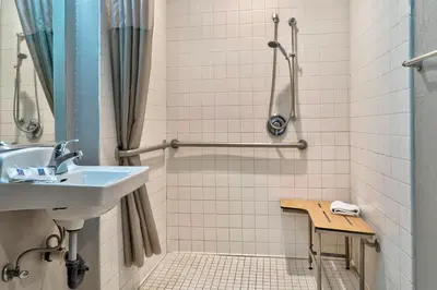a bathroom with a sink and a shower at Motel 6-El Monte, CA - Los Angeles in El Monte