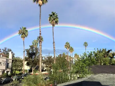 a rainbow in the sky with palm trees at Double Suite Santa Monica - Free Parking in Santa Monica
