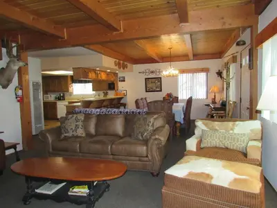 a living room with a couch and a table at Miller's Outpost in Big Bear Lake