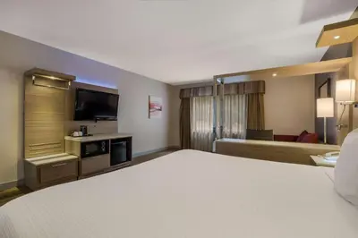 a hotel room with a bed and a television at Best Western Diamond Bar Hotel & Suites in Diamond Bar