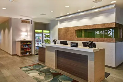 a lobby of a home store with a counter at Home2 Suites by Hilton Victorville in Victorville