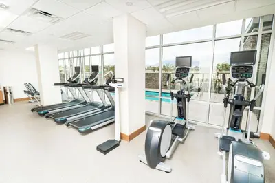 a gym with treadmills and cardio machines in a building at SpringHill Suites by Marriott Ontario Airport/Rancho Cucamonga in Ontario