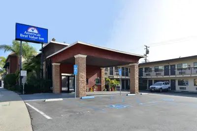 a parking lot in front of a hotel at Americas Best Value Inn Pasadena in Pasadena