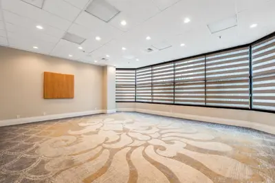 a large room with a large rug on the floor at Hotel Huntington Beach in Huntington Beach