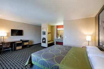 a hotel room with a bed and a desk at The Hotel 39 in Westminster