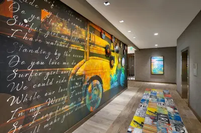 a hallway with a large mural of a bus at TownePlace Suites by Marriott Los Angeles LAX/Hawthorne in Hawthorne
