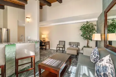 a lobby with a bar and a living room at Best Western Plus Carpinteria Inn in Carpinteria