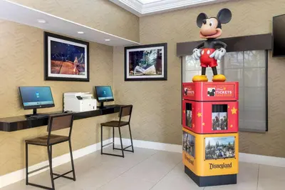 a room with a mickey mouse machine in a office at Best Western Plus Raffles Inn & Suites in Anaheim