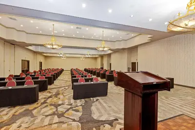 a conference room with chairs and a podium in it at Doubletree by Hilton Whittier in Whittier