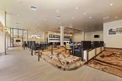 a store with a lobby with tables and chairs at Doubletree by Hilton Whittier in Whittier