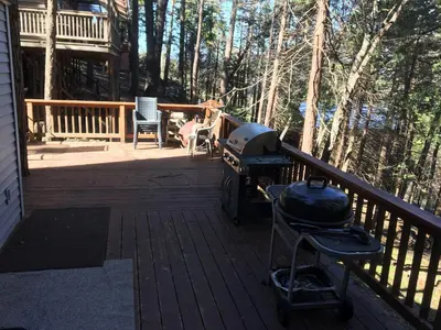 a grill on a deck with a house at Sequoia National Forest CabinG in Panorama Heights