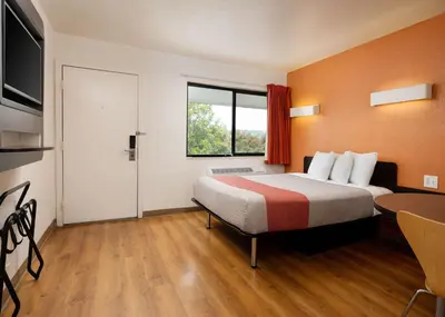 a hotel room with a bed and a window at Motel 6-Camarillo, CA in Camarillo