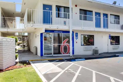a building with a sign in front of it at Motel 6-Bakersfield, CA - South in Bakersfield
