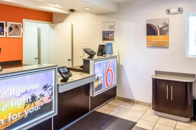 a waiting room with a reception desk and a phone at Motel 6-Bakersfield, CA - East in Bakersfield