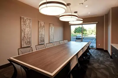 a large conference room with a long table and chairs at Home2 Suites by Hilton Los Angeles Montebello in Montebello