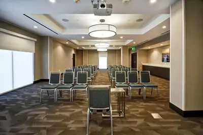 a conference room with chairs and a table in a room at Home2 Suites by Hilton Los Angeles Montebello in Montebello