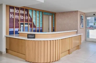 a lobby with a counter in a store at Hampton Inn & Suites Hermosa Beach in Hermosa Beach