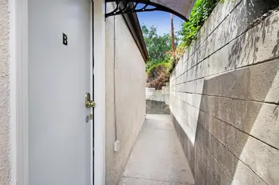 a door leading to a hallway with a wall at Beautiful House Fantastic view in Azusa in Azusa