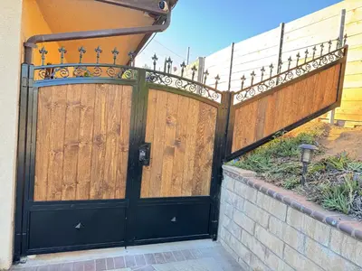 a wooden gate with a fence on a house at Beautiful House Fantastic view in Azusa in Azusa
