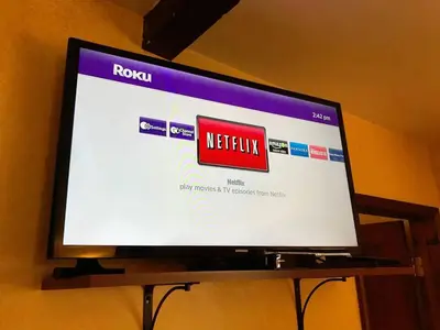 a flat screen tv sitting on top of a stand at Ocean View Casita in Los Angeles