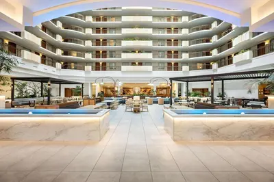 an image of the lobby of a hotel at Embassy Suites by Hilton Anaheim South in Anaheim
