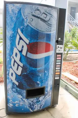a vending machine with a bottle of soda at Crescent Inn in Wilmington