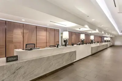 a long row of mirrors in a waiting room at Hilton Anaheim in Anaheim