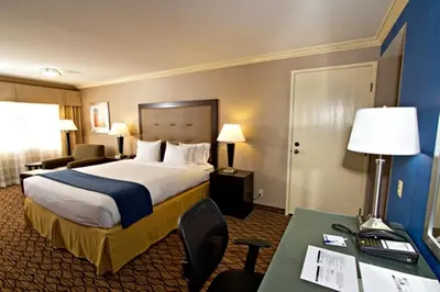 a hotel room with a bed and a desk at Holiday Inn Express Port Hueneme by IHG in Port Hueneme