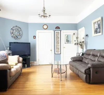 a living room with a couch and a table at Cozy Suite near City of hope in Duarte