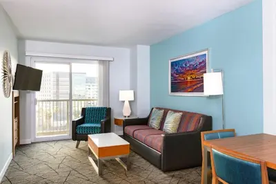 a living room with a couch and a table at WorldMark Anaheim in Anaheim