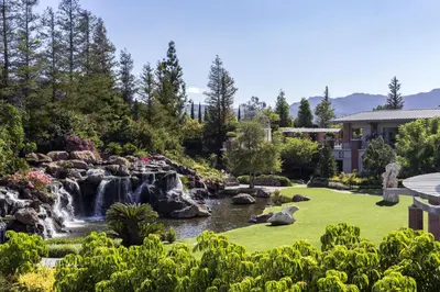 a garden with a waterfall and a pond at Four Seasons Hotel Westlake Village in Westlake Village