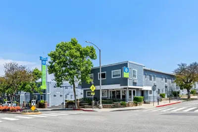 an empty street in front of a building at SureStay Hotel by Best Western Santa Monica in Los Angeles