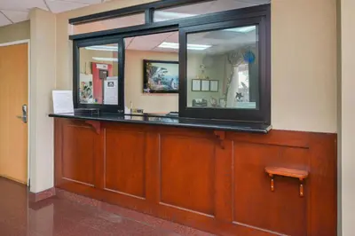 a counter in a room with a mirror at H3 Inn & Suites - LAX Airport - Los Angeles in Inglewood
