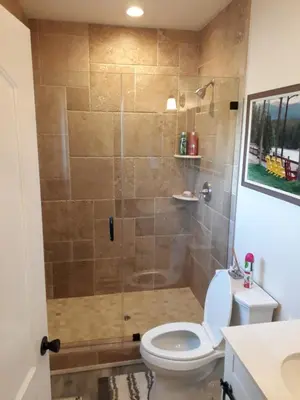 a bathroom with a shower with a toilet at Comfortable Luxury Studio in Los Angeles
