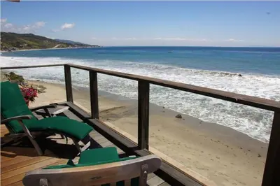 a view of the beach from a balcony at Villa Rylee in Malibu