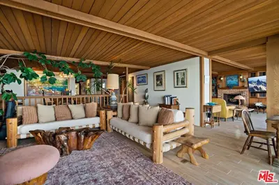 a large living room with couches and a table at Villa Rylee in Malibu
