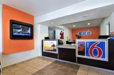 a fast food restaurant with a television on the wall at Motel 6-Big Bear Lake, CA in Big Bear Lake